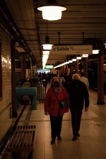 An elder couple at the subway in downtown Buenos Aires, Argentina