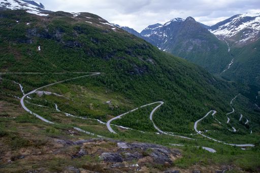 Wonderful landscapes in Norway. Vestland. Beautiful scenery of winding roads and snowed mountains from the Gaularfjellet scenic route.