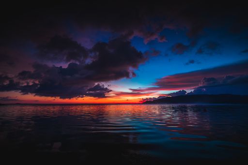 A magnificent view of the peaceful ocean at sunset captured in Lombok, Indonesia
