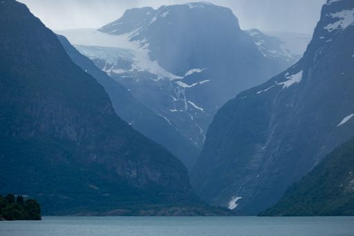 Wonderful landscapes in Norway. Vestland. Beautiful scenery of Briksdalsbreen glacier in Briksdalbre. Oldevatnet lake. Mountains, rocks and snow.