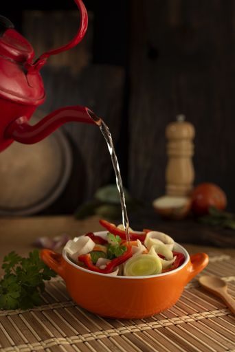 A closeup shot of delicious asian soup with different vegetables