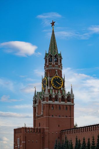 A vertical shot of the Spasskaya Tower of the Moscow Kremlin on Red Square