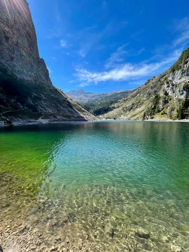 A mesmerizing vertical display of the turquoise waters of lake Krn in Slovenia