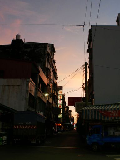 A vertical shot of the Taiwanese market at a sunset