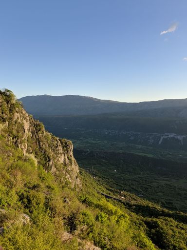 A vertical shot of a mountain landscape