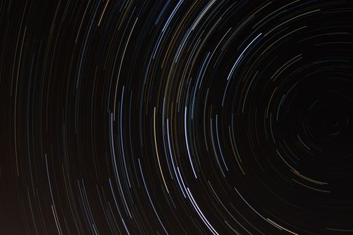 A low angle shot of a starry sky with long exposure at night in Newcastle, England