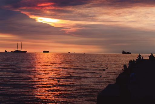 A landscape view of the sea at sunset. Trieste, Italy