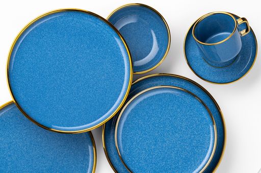 A Set of blue ceramic plates and cup on a white background