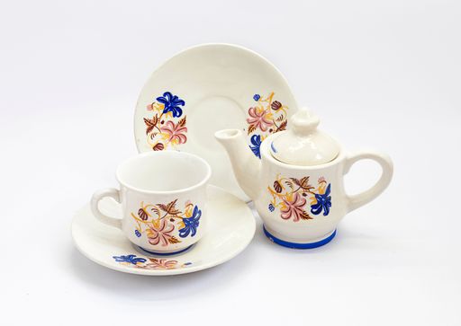 A beautiful floral pattern teacup porcelain, teapot with plate isolated on white background