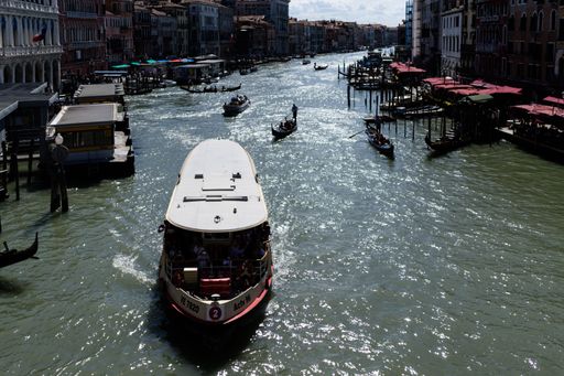 A View of boat crossing the Venice canals in Italy