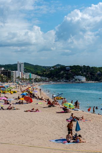 Lloret de Mar, Spain : 2020 2 Sept : People in the beach of Lloret de Mar after Covid 19 without international tourists in summer 2020