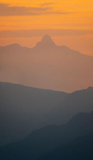 A beautiful shot of the silhouette of Alpine mountains in South Tyrol during the sunset