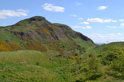 A beautiful shot of people in Arthur's Seat in Edinburgh, Scotland