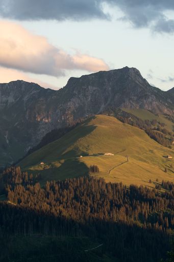 A vertical shot of beautiful mountains on a sunny day