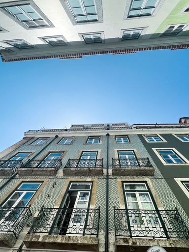 A vertical shot of modern buildings in Lisbon, Portugal