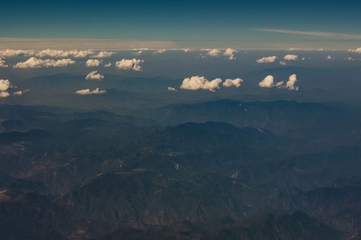 The Mexican mountains with few clouds seen from a plane