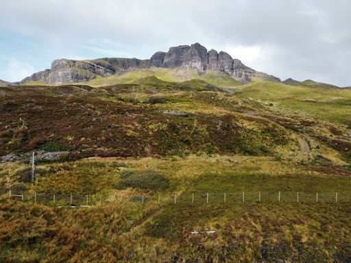 A beautiful landscape of the Old Man of Storr from a hiking trail