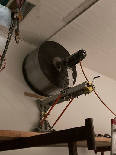 A vertical shot of a garage door cable