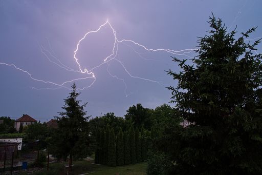This flash was shoot from my balcony. If you look close, you can see an old woman face.