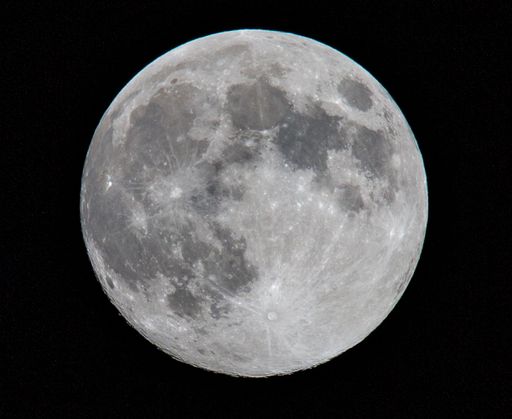 AN amazing shot of the full moon isolated on a black background