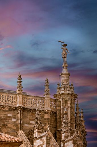The statue of the maragato Pedro Mato in one of the towers of the cathedral of Astorga