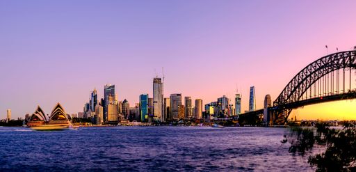 A panoramic view of the cityscape of the Sydney, Australia at sunset