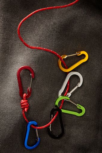 Small colorful carabiners, accessories commonly used for hooks, key chains or other light objects