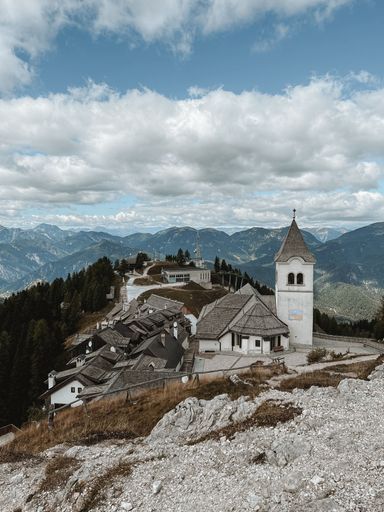 A beautiful view of a village at Monte Lussari on a cloudy day