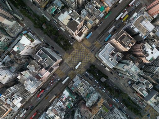 The bird's eye view of modern city buildings in Kowloon area. Hong Kong.