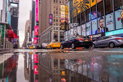 A low angle shot of Times Square in New York, USA