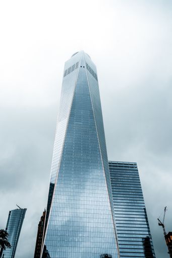 A vertical low angle shot of the World Trade Center in New York City
