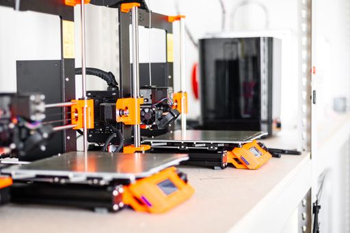 A closeup of 3D printers. 3D printing equipment.