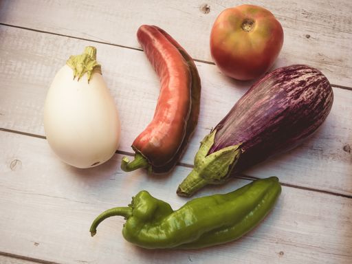 A top view of vegetables on a wooden surface