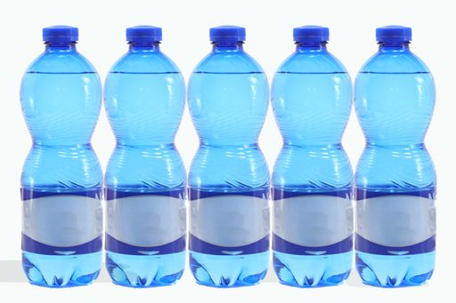 A closeup of mineral water bottles isolated on a white background