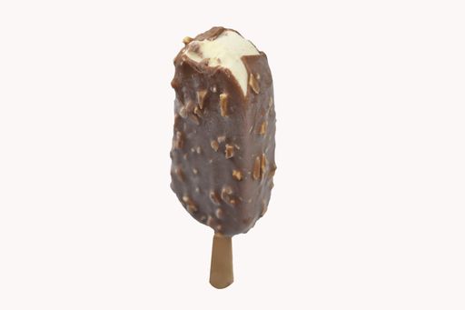 A closeup of ice cream with nut and chocolate topping isolated on a white background