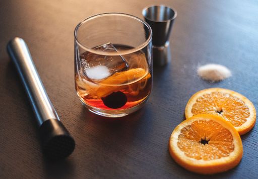 A closeup shot of a cocktail in a bar