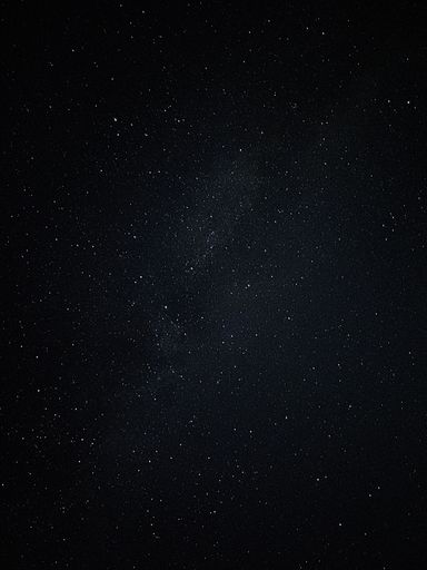A vertical shot of a starry sky