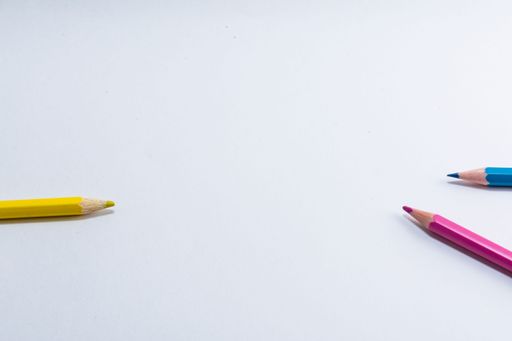 Colorful wooden pencils isolated on white background. close up