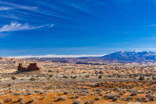 A beautiful landscape shot of Arches National Park and the La Sal Mountains in Utah, USA