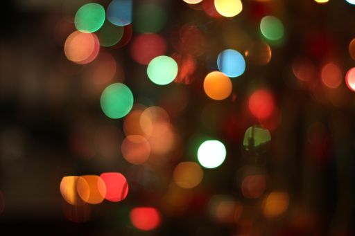 A blurry background with colorful bokeh lights