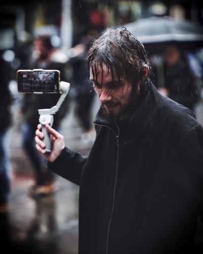 A man live streaming a freedom protest in Melbourne