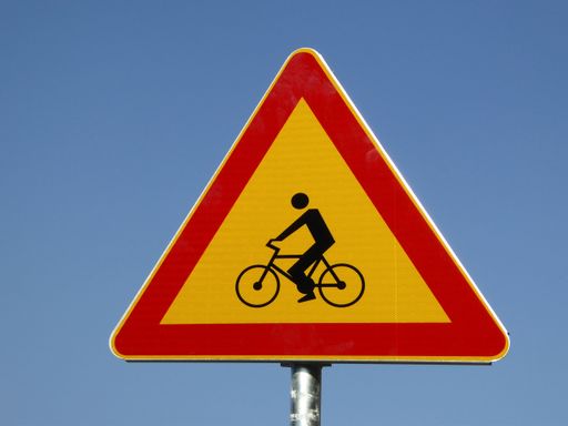 Traffic sign bicycle - against blue sky