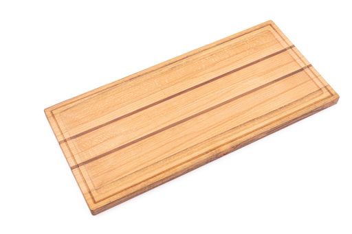 A rectangular shaped wooden cutting board isolated on a white background