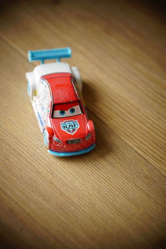A Mattel brand Disney Pixar toy model car from the Cars mov