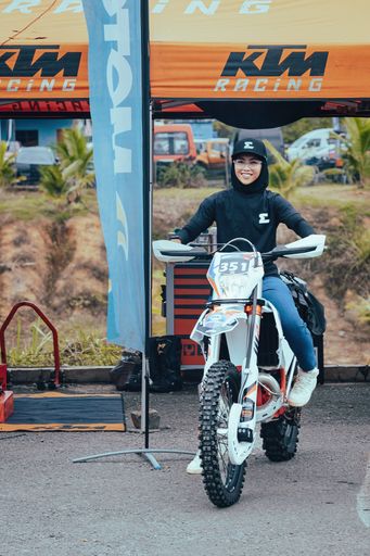 Pahang, Malaysia - Sept 24, 2022 Female Motorcyclist on the bike at the Rimba Raid event.