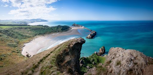 The beautiful view of turquoise water and rocky shoreline. Castlepoint, Wairarapa, New Zealand.