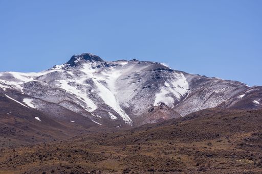 A scenic shot of the Andes mountains covered in snow captured in Mendoza, Argentina