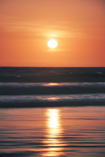 A beautiful view of a beach in Bali during sunset