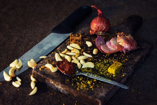A high angle shot of fresh vegetables on the cutting board