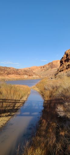 A vertical shot of the Colorado River on a sunny day, Grand Canyon